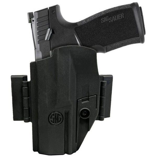 Handgun in black holster, side view