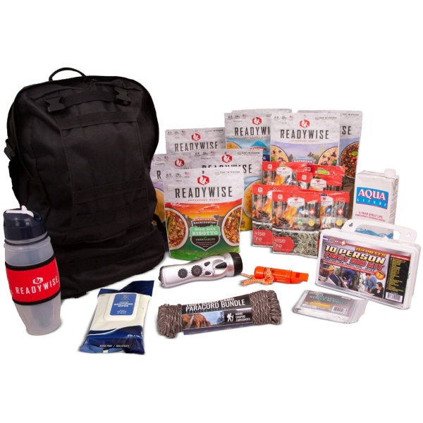 Emergency survival kit with backpack and supplies.