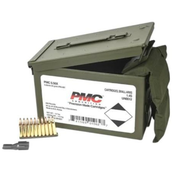 Open ammunition box with bullets and clip.