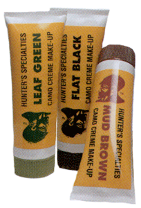 Camouflage makeup tubes: green, black, brown.