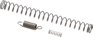 Various metal springs on white background.