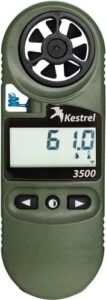 Digital handheld anemometer displaying temperature reading.