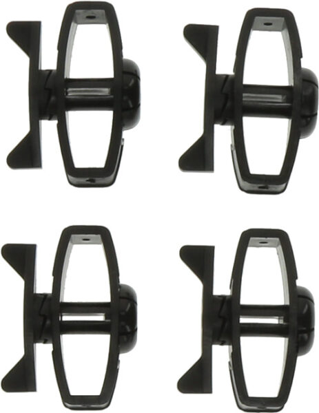 Four black plastic slot car wheels on white background