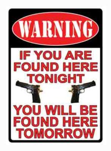 Warning sign with guns, safety threat message