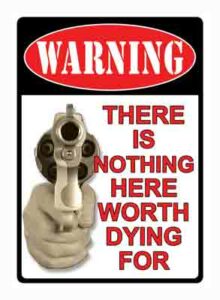 Warning sign with gun, nothing worth dying for.