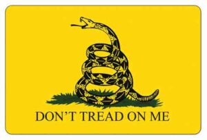 Gadsden flag with coiled rattlesnake and slogan.
