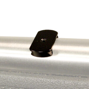 Close-up of black clip on metal pole.