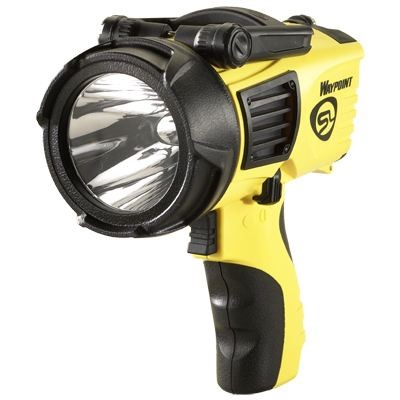 Yellow handheld spotlight with black grips and lens