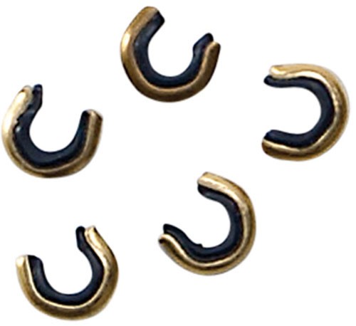 Gold and black horseshoe-shaped objects