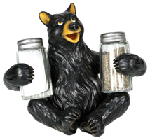 Bear holding salt and pepper shakers