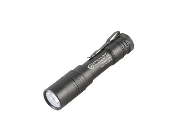 Black tactical flashlight with clip.