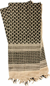 Traditional black and white patterned keffiyeh scarf.