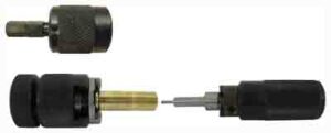 Disassembled drill bit tool with components visible.