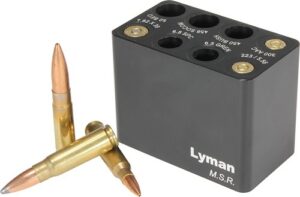 Lyman bullet storage block with three cartridges.