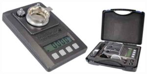 Digital pocket scale with protective case.