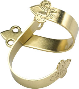 Gold fleur-de-lis napkin ring with cutout design.
