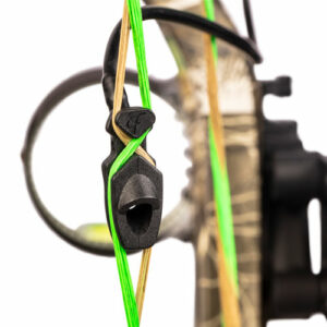 Close-up of compound bow with green strings.