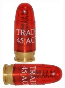 Red .45 ACP snap caps for dry fire practice.