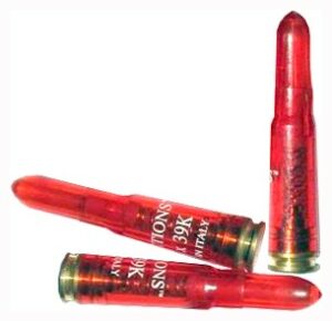 Three red dummy rifle rounds for training