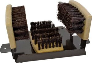 Footwear cleaning brush with bristles and grips