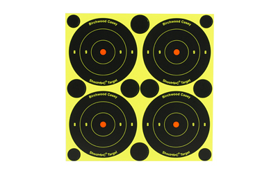 Four circular shooting targets on yellow background