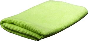 Folded green microfiber cloth on white background.