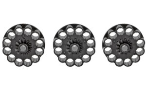 Three black toy gun cylinder caps