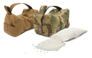 Camouflage and tan shooting bags with plastic pellets