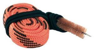 Rifle bore cleaner with red cord and brush.