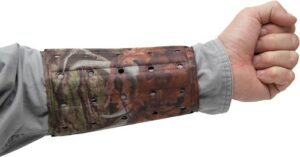 Camo archery arm guard with ventilation holes.