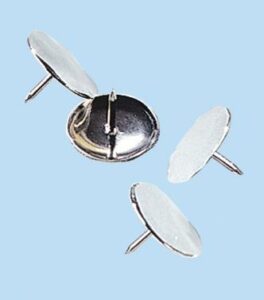 Three silver thumbtacks on blue background
