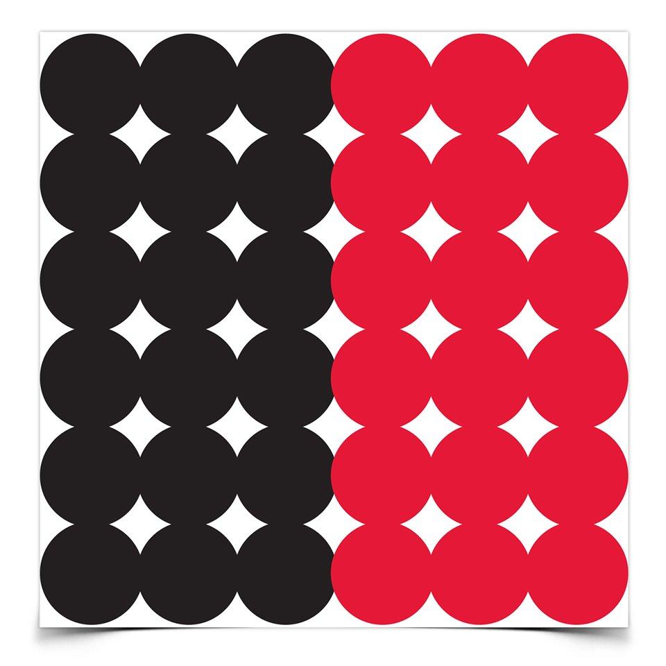 Geometric pattern with black and red circles.