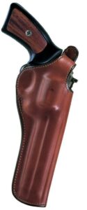 Leather gun holster with wooden grip handle.