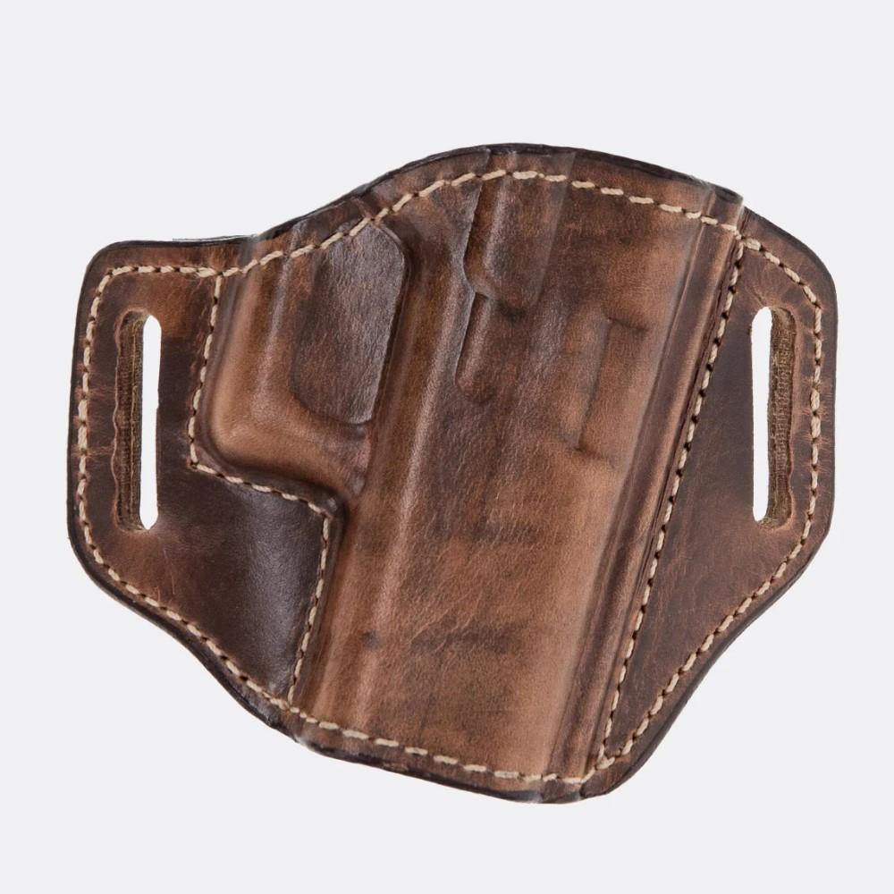 Brown leather handgun holster with stitching.