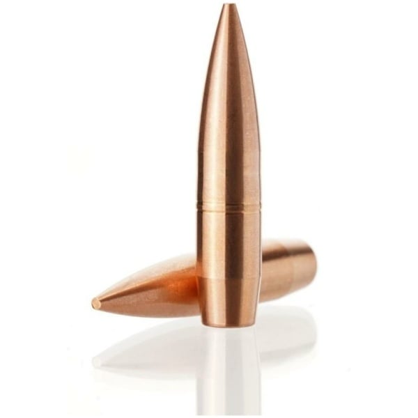 Copper bullets on white background