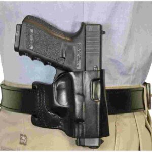 Black holstered handgun on belt