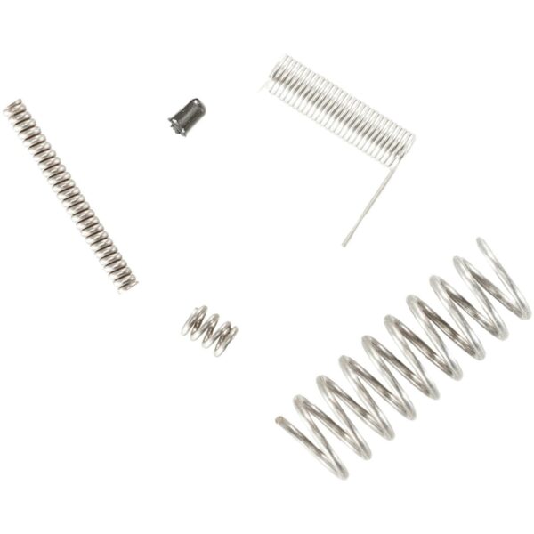 Various metal springs on white background