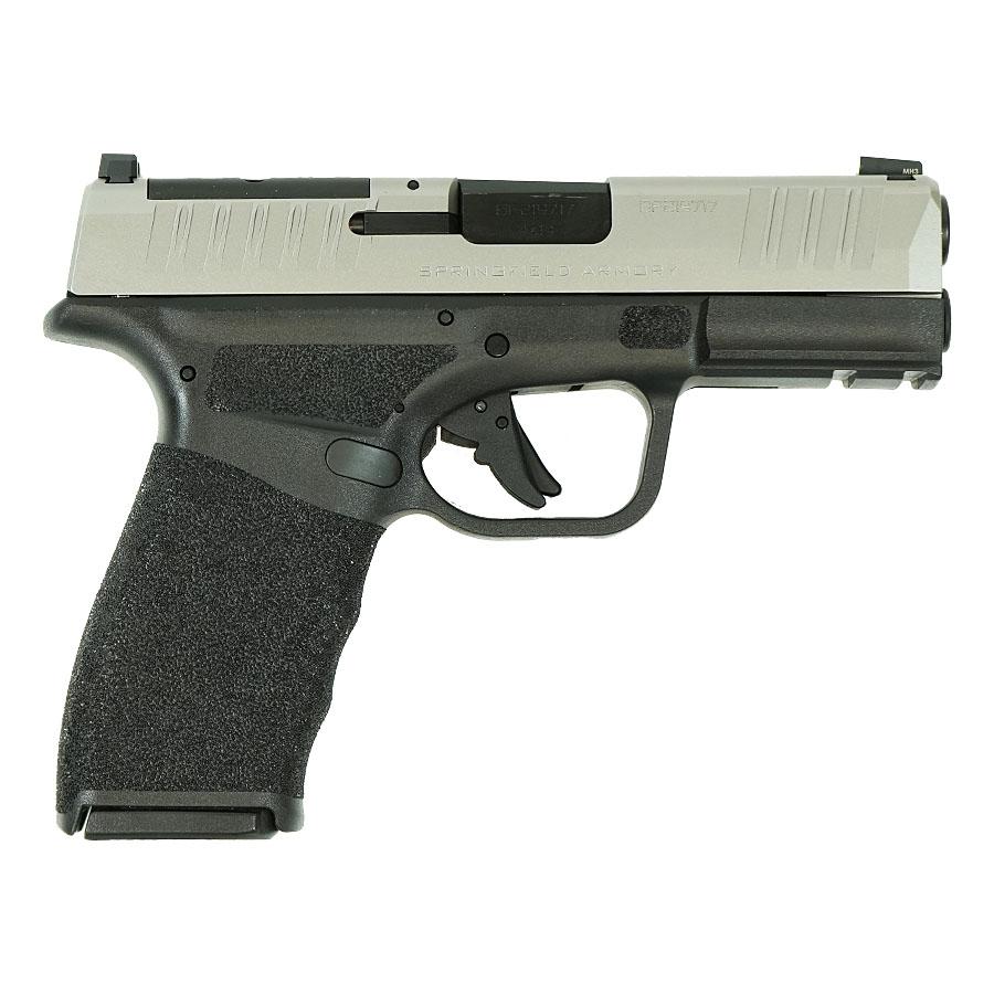 Black and silver semi-automatic handgun, side view.