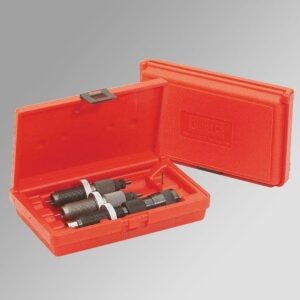 Red tool case with metal reloading dies.