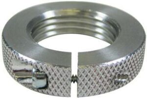 Silver knurled lock nut with slit and screw.