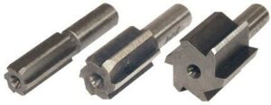 Three metal broaching tools for machining.