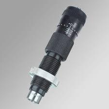 Black bullet reloading die on gray background