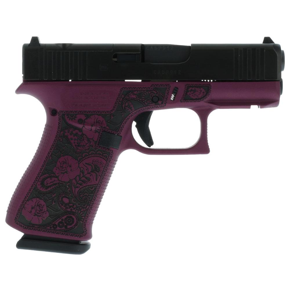 Purple handgun with floral engravings