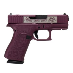 Purple handgun with floral engraving design.
