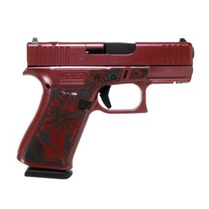Red floral-designed handgun on white background.