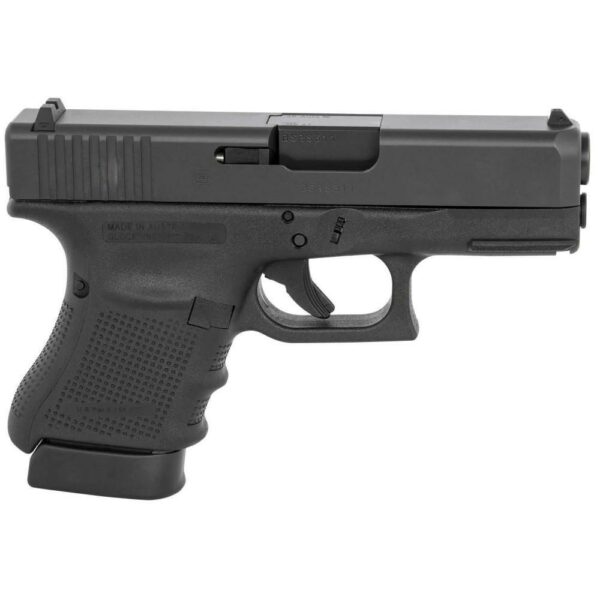 Black handgun with textured grip, side view.