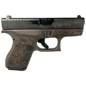 Decorative engraved handgun side view
