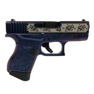 Decorative handgun with floral engravings.
