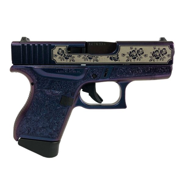 Decorative handgun with floral engravings.