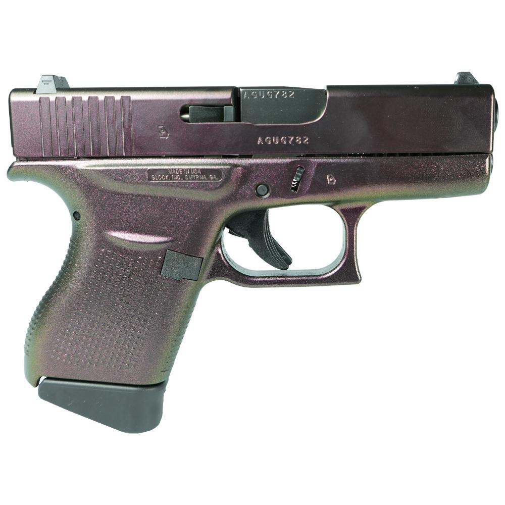 Compact handgun with metallic finish.